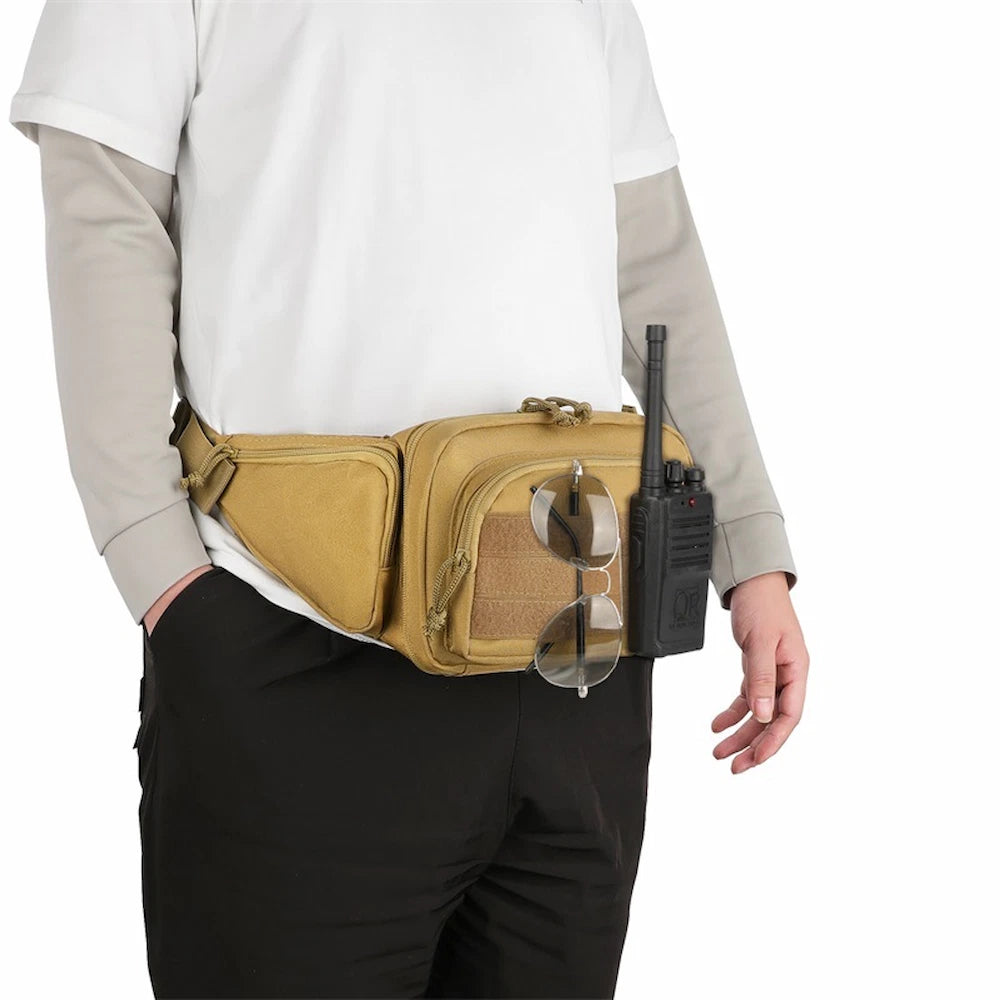 Man wearing a khaki tactical waist pouch with sunglasses and a walkie talkie attached